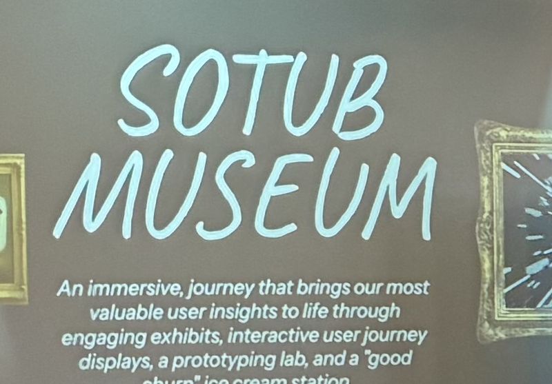 Projected museum title reading SOTUB Museum, an immersive journey that brings our most valuable user insights to life
